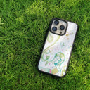 black case with white back panel of a girl in nature with flowers, pretty ink style